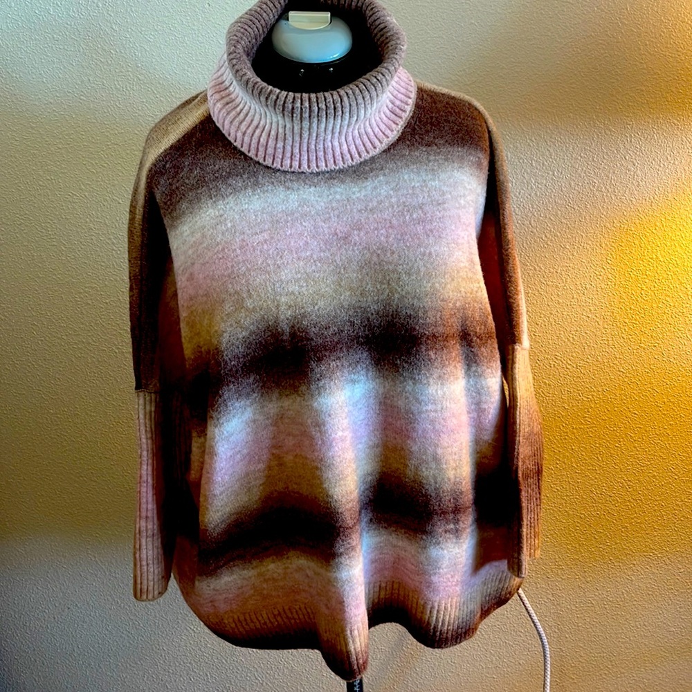 Fits as XXL LOFT never worn wool ply blend super soft covers butt says large
